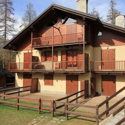 Favoloso appartamento con camino in pineta