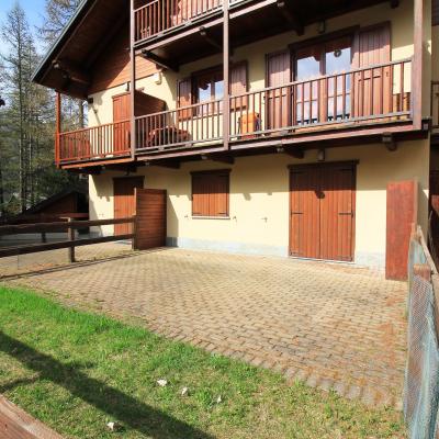 Favoloso appartamento con camino in pineta